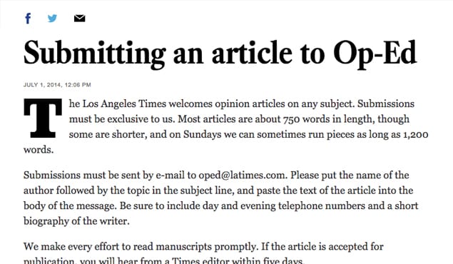 Person typing op-ed on laptop computer