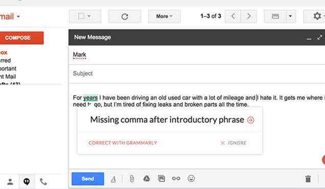 Person writing email on laptop computer