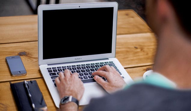 Person sending polite email follow-up message
