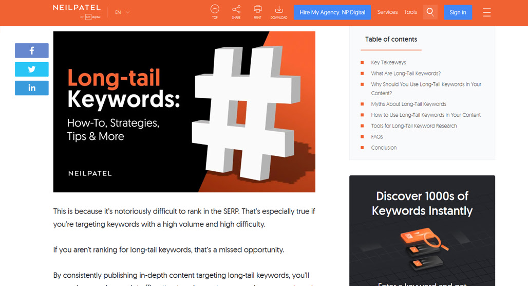 Person researching long-tail keywords on laptop